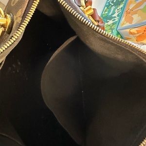 Louis Vuitton V purse